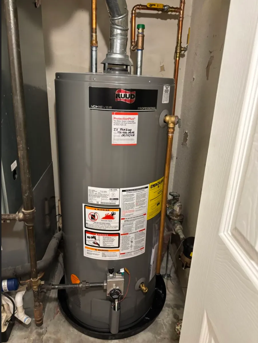 New Ruud gas water heater with new copper supply piping and valve