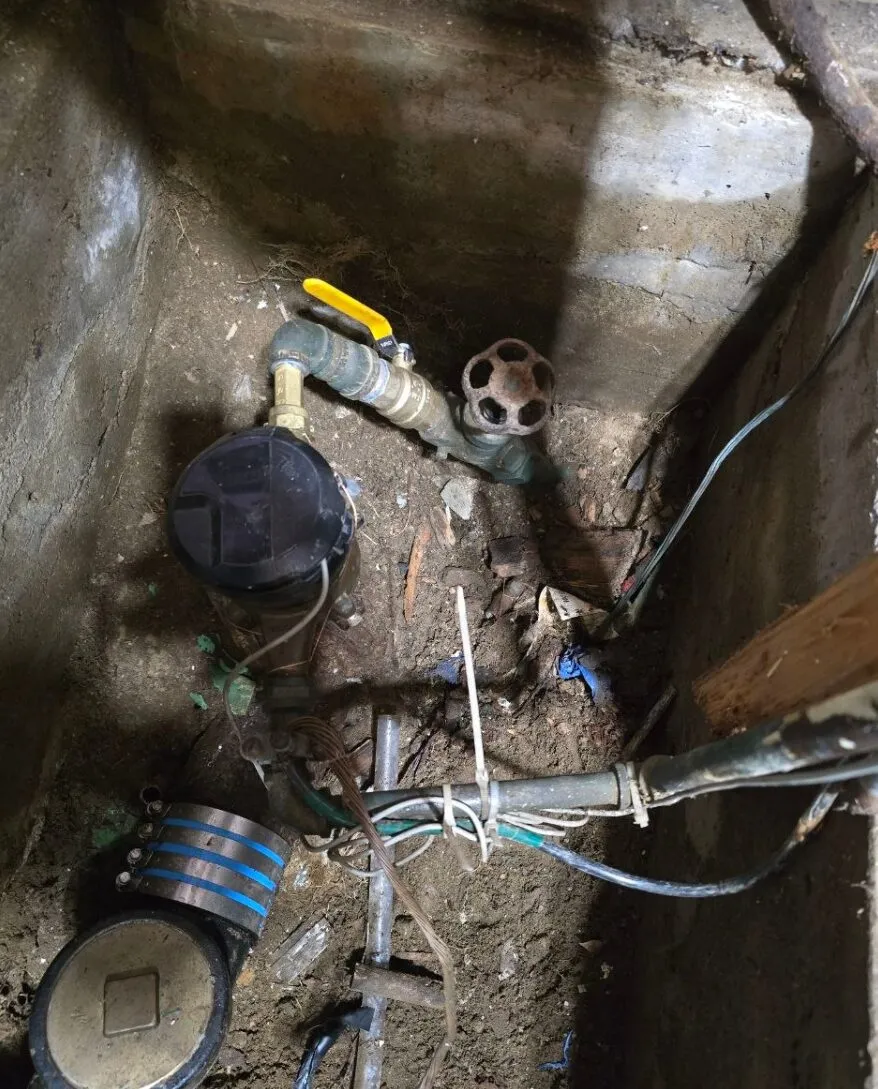 Water meter pit after emergency valve and connection repair