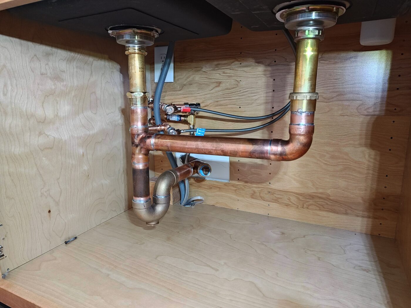 Under-sink copper drain and P-trap assembly with dishwasher and disposal connections