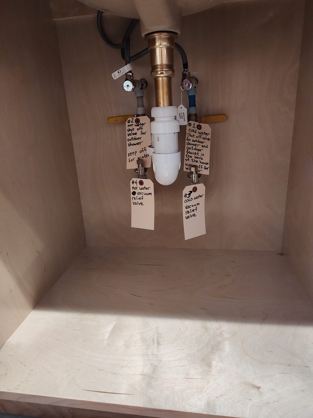 Bathroom shower and tub valve rough-in with copper supply lines before tiling