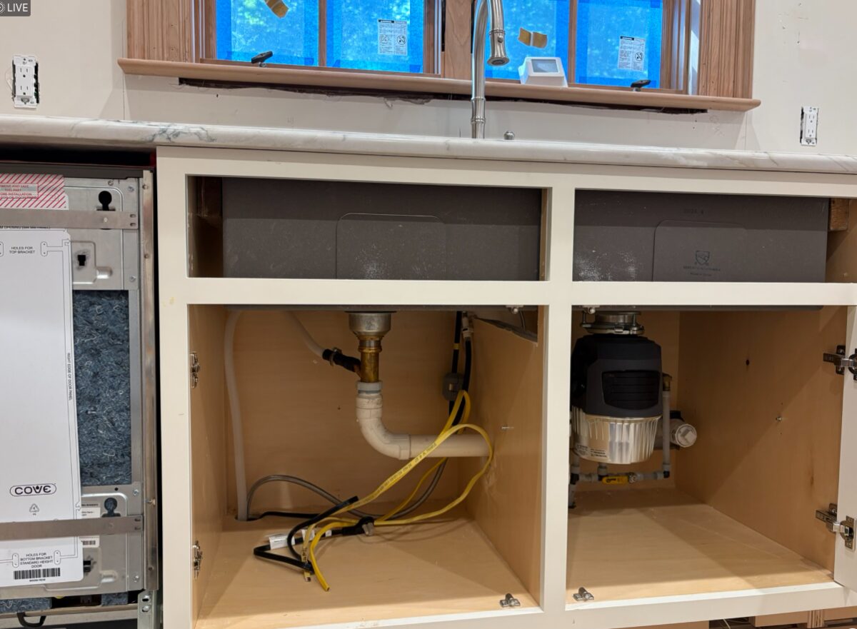 Under-sink kitchen rough-in with garbage disposal, P-trap drain and dishwasher supply connections